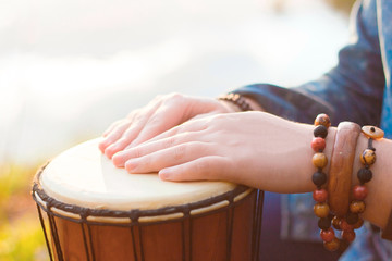 Playing the djembe