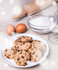 bakery concept - ingredients for cooking chocolate chip cookies