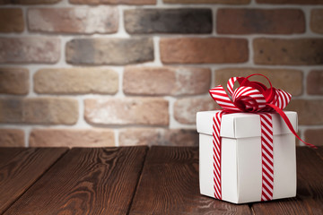 Christmas gift box on wooden table
