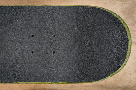 top view of a skateboard and griptape in skatepark