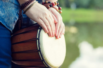 Playing the djembe