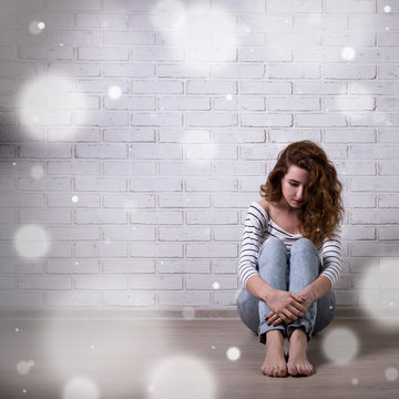 Winter Depression And Loneliness - Unhappy Woman Sitting On The