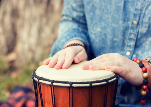 Playing the djembe