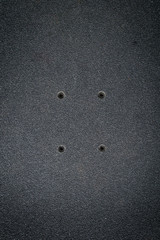 top view of a skateboard and griptape in skatepark