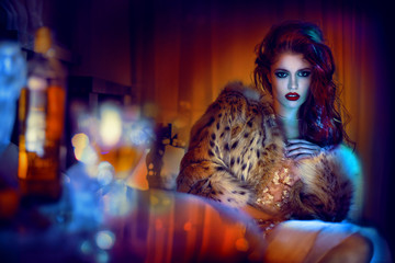 Woman wearing fur coat, portrait 