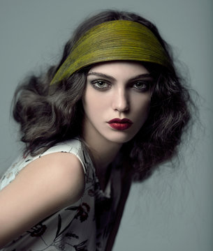 Woman wearing headband made of leaf