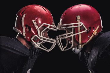 Football player on dark background