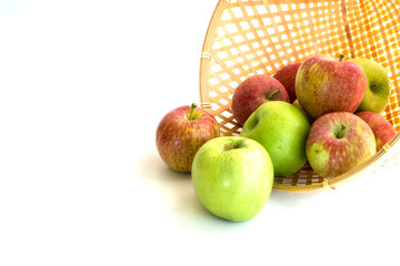 basket of green and red apples