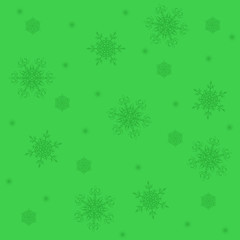 White snowflakes,christmas pattern on the green background
