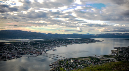 Sunset in the city of Tromso view from the top of Storsteinen in Norway.