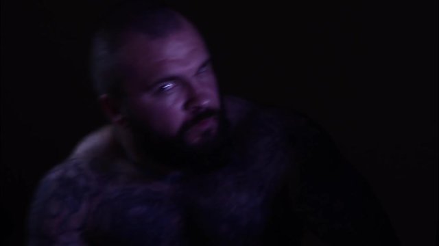 Tattooed psycho man. Timelapse.