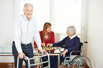 Fototapeta premium Daughter visiting grandparents in nursing home