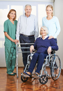 Geriatric caregiver with senior couple