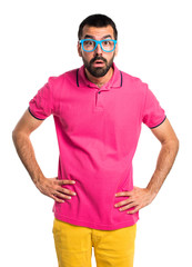 Tired man with colorful clothes