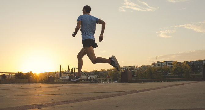 Man running, Harriet Island, Saint Paul, Hokah, Houston County, Minnesota, USA , back view 