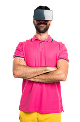 Man with colorful clothes using VR glasses