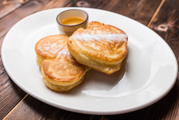 Fried fritters on plate