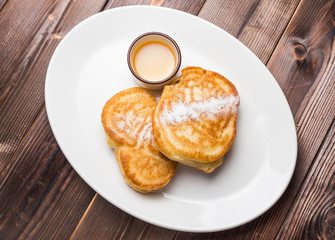 Fried fritters on plate