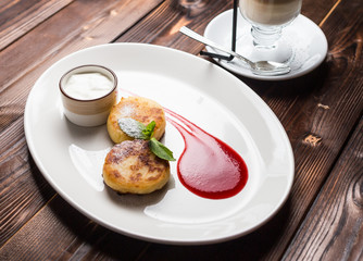 Fried fritters on plate