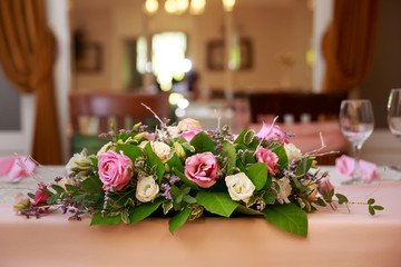 bride and groom table flower arrangement