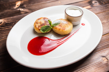 Fried fritters on plate