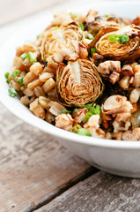 Lemony wheat berries served with roasted Brussels sprouts, shallots and walnuts.