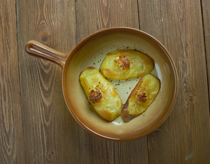 Baked potatoes with sauce