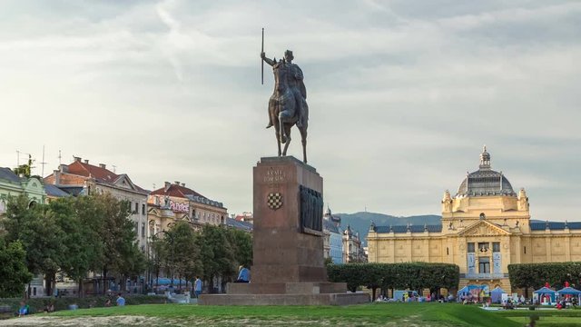 Monument of the Croatian King Tomislav timelapse hyperlapse and art pavilion in colorful park, in Zagreb, capital of Croatia
