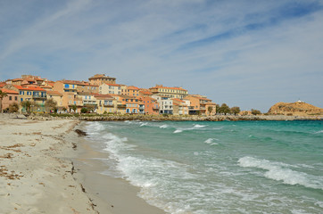 Fototapeta na wymiar Sandy beach in the Corsican town l'Iles-Rousse