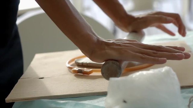 bake rolls out the dough on a silicone mat sprinkled with flour