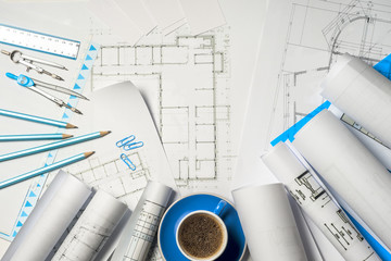 Workplace of architect - rolls and plans.