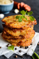 Fried sour cabbage pancakes with potato and sausage