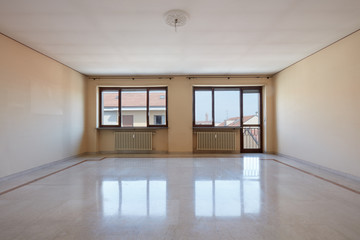 Empty living room with marble floor