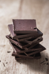 Stack of Chocolate Bars on Wooden Surface