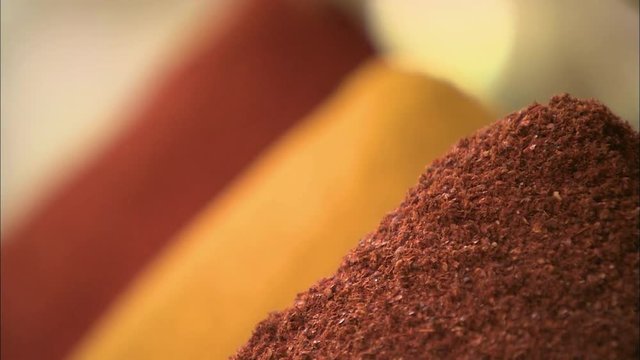 Heaps of Colorful spices in a market stall, Morocco
