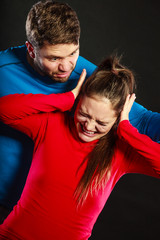 Fototapeta premium Man husband abusing woman wife. Violence.