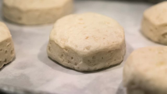 Biscuits rising in the oven time lapse video.