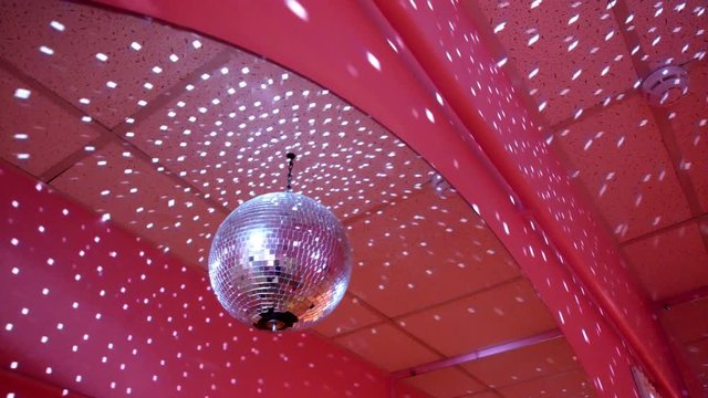 Glamour mirror discoball spining around with reflection rays, 4K