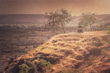 Old rickshaw on indian road