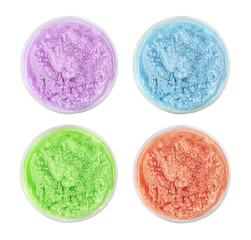 Collage of natural scrubs in container on white background