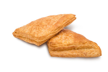 Puff pastry with jam on white background
