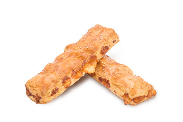 Puff pastry with jam on white background
