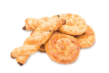 variety of fresh pastries on white background
