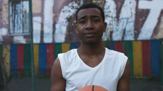 NEW YORK CITY: portrait of an African American boy basketball player