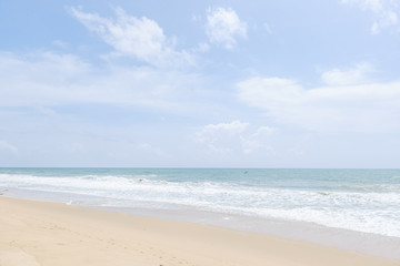 Fototapeta na wymiar Empty sandy beach with sea under blue sky in thailand