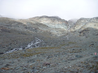 climbing rocky route to the grossglockner mountain
