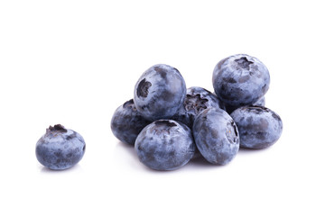 close up of blueberries on white background