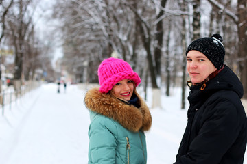 Fototapeta premium couple of lovers walk in winter park