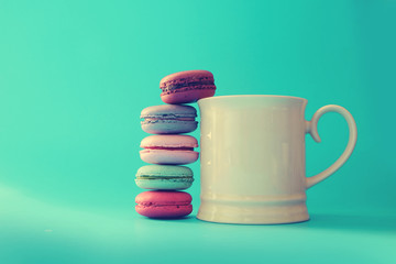 Sweet and colourful french macaroons.Vintage or retro effected photo.