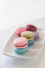 Sweet and colourful french macaroons.Vintage or retro effected p
